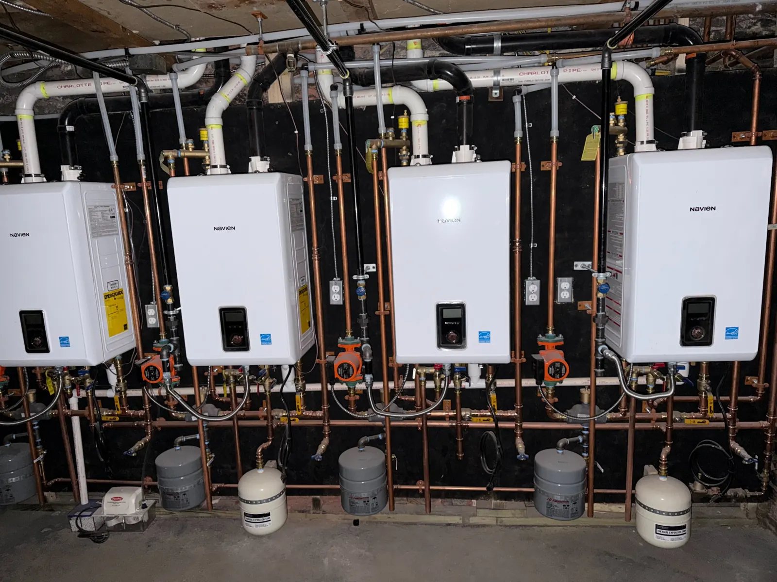 E-Star HVAC wall-mounted Navien units and mechanical piping